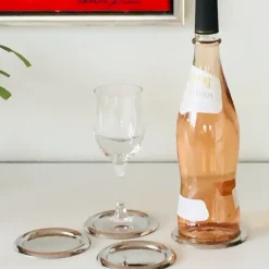 - BORDBRIK TIL VINFLASKE 4 STK. Ø10 CM.^Steel Function Sale